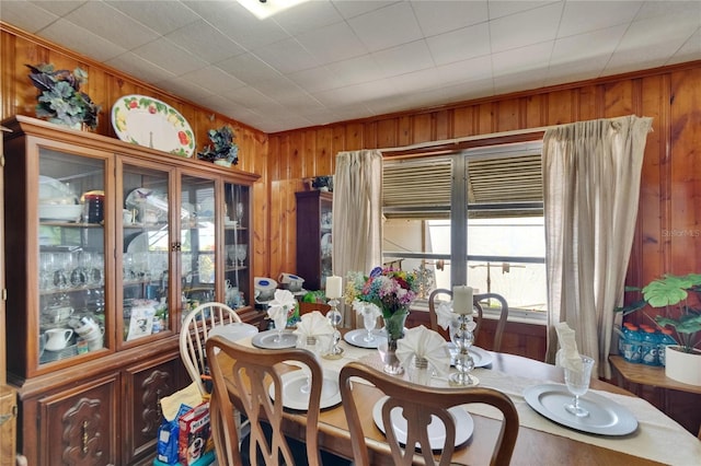 3626 S Hesperides St, Tampa, FL 33629 - dining room featuring wood walls