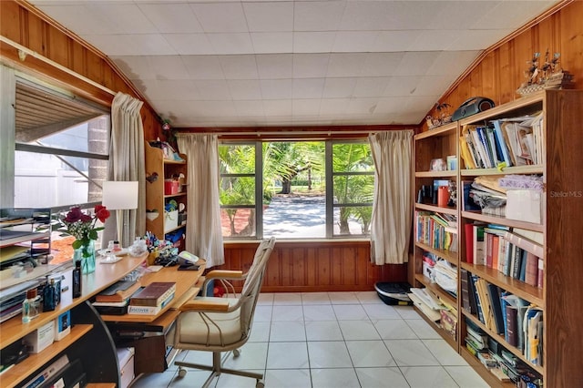 3626 S Hesperides St, Tampa, FL 33629 - office with wood walls, light tile patterned floors, and lofted ceiling