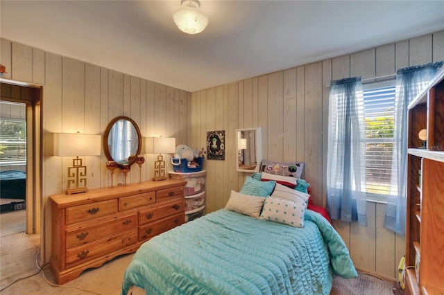 3626 S Hesperides St, Tampa, FL 33629 - bedroom featuring light carpet and wood walls