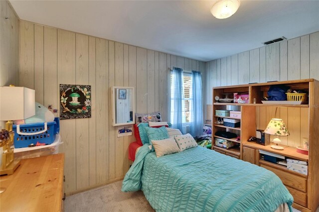 3626 S Hesperides St, Tampa, FL 33629 - carpeted bedroom featuring wooden walls