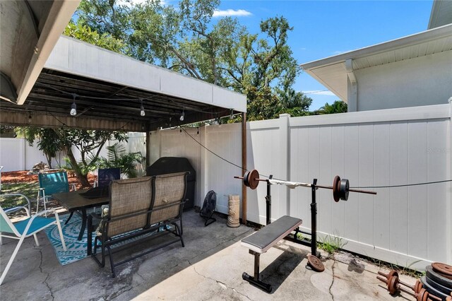 3626 S Hesperides St, Tampa, FL 33629 - fenced backyard featuring outdoor dining area and a patio