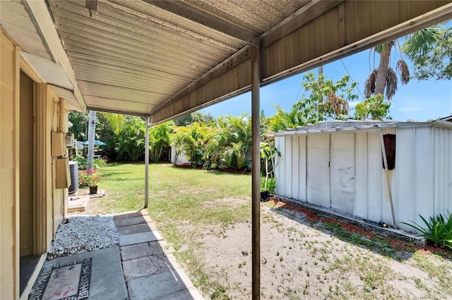 3626 S Hesperides St, Tampa, FL 33629 - view of grassy yard with central AC