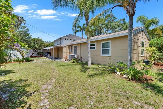 3626 S Hesperides St, Tampa, FL 33629 - back of property featuring cooling unit
