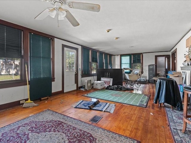 485 E Stanford St, Bartow, FL 33830 - living room with hardwood / wood-style floors, a ceiling fan, and baseboards