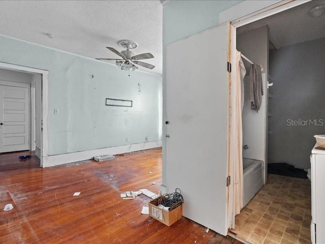 485 E Stanford St, Bartow, FL 33830 - spare room with a ceiling fan, wood finished floors, and a textured ceiling