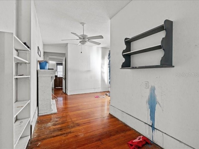 485 E Stanford St, Bartow, FL 33830 - hall with wood finished floors and baseboards