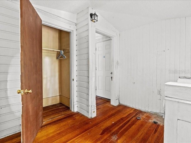 485 E Stanford St, Bartow, FL 33830 - interior space with hardwood / wood-style floors, wood walls, and lofted ceiling