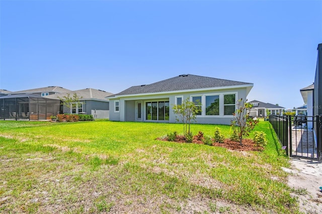 rear view of property with stucco siding