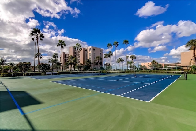 7465 Bay Island Dr S Unit 213, South Pasadena, FL 33707 - view of tennis court with community basketball court