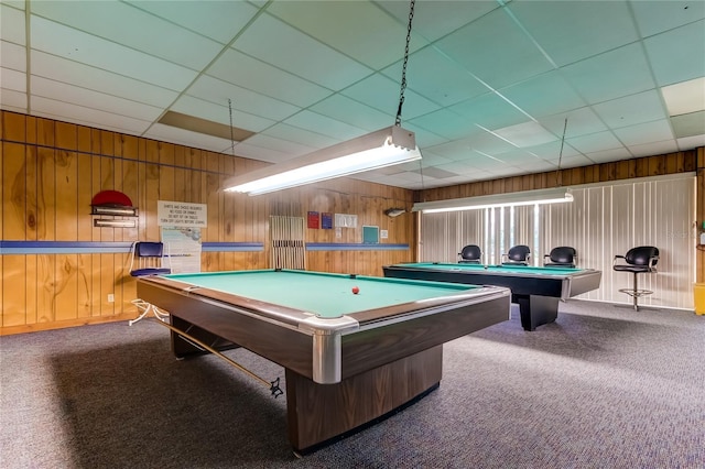 7465 Bay Island Dr S Unit 213, South Pasadena, FL 33707 - rec room featuring wood walls, billiards table, carpet flooring, and a drop ceiling