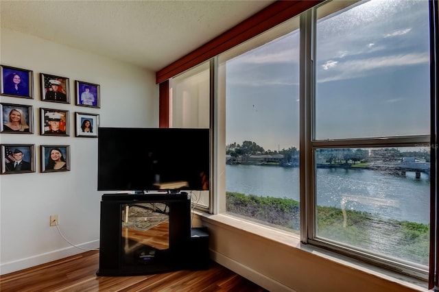 7465 Bay Island Dr S Unit 213, South Pasadena, FL 33707 - home office with wood finished floors and baseboards