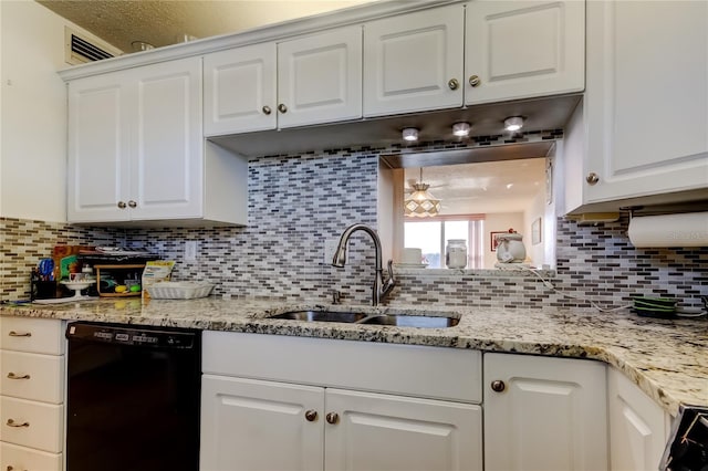 7465 Bay Island Dr S Unit 213, South Pasadena, FL 33707 - kitchen with dishwasher, a sink, tasteful backsplash, and white cabinetry