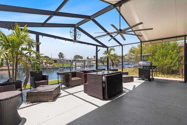 5051 Bonito Dr, New Port Richey, FL 34652 - view of patio featuring an outdoor hangout area, a grill, a water view, and glass enclosure