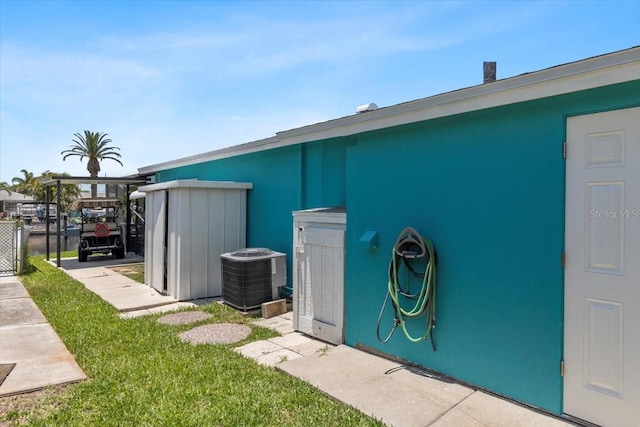 5051 Bonito Dr, New Port Richey, FL 34652 - view of outbuilding with central AC unit