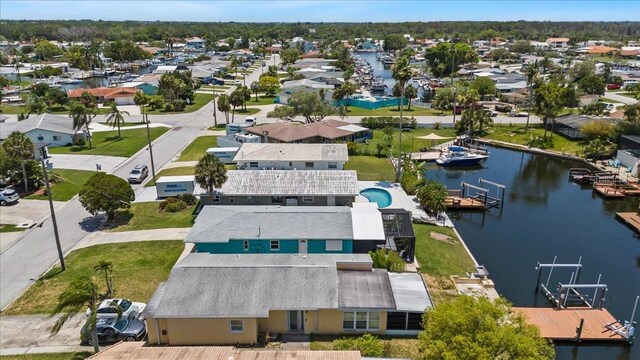 5051 Bonito Dr, New Port Richey, FL 34652 - aerial view of residential area with a large body of water