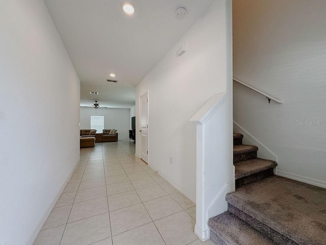 6444 Bar S Bar Trl, Zephyrhills, FL 33541 - stairway featuring tile patterned flooring, recessed lighting, and baseboards
