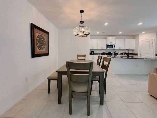 6444 Bar S Bar Trl, Zephyrhills, FL 33541 - dining space with a chandelier, light tile patterned floors, recessed lighting, and baseboards