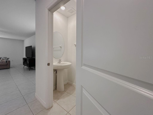6444 Bar S Bar Trl, Zephyrhills, FL 33541 - bathroom with tile patterned flooring and baseboards