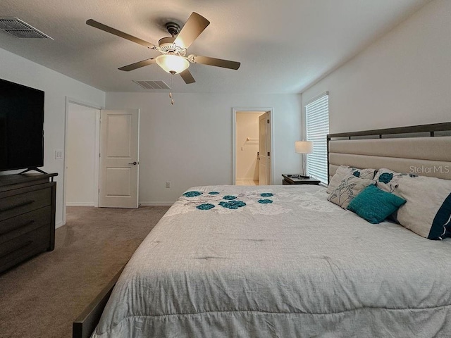 6444 Bar S Bar Trl, Zephyrhills, FL 33541 - carpeted bedroom with baseboards, a ceiling fan, and connected bathroom