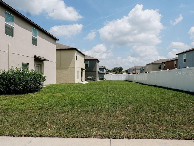 6444 Bar S Bar Trl, Zephyrhills, FL 33541 - view of yard featuring a residential view