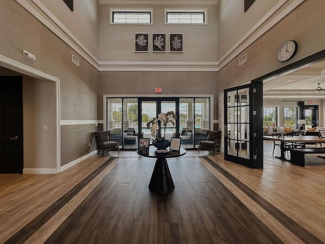 6444 Bar S Bar Trl, Zephyrhills, FL 33541 - building lobby with a high ceiling and wainscoting