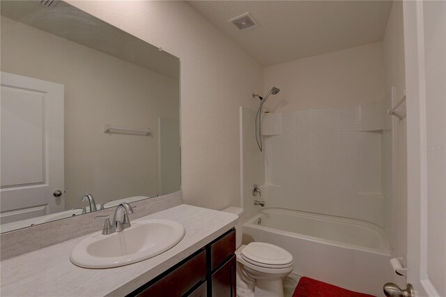 33062 Frosted Clover Way, Wesley Chapel, FL 33545 - full bath featuring toilet, vanity, and shower / tub combination