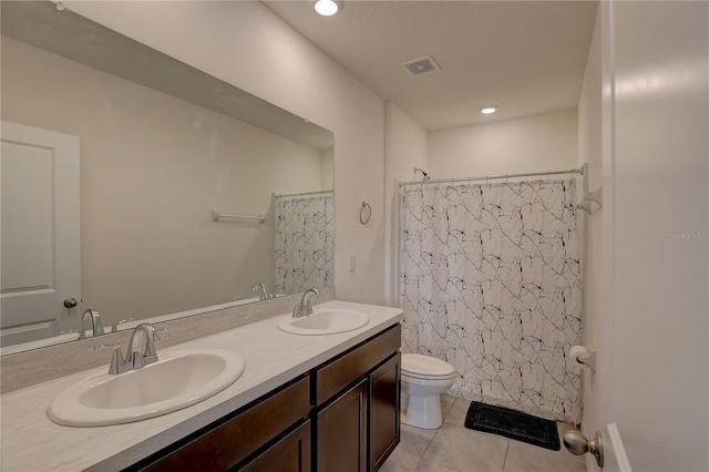 33062 Frosted Clover Way, Wesley Chapel, FL 33545 - bathroom with toilet, tile patterned flooring, double vanity, and a shower with shower curtain