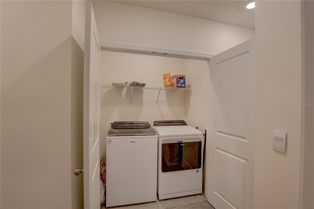 33062 Frosted Clover Way, Wesley Chapel, FL 33545 - laundry area with washing machine and clothes dryer