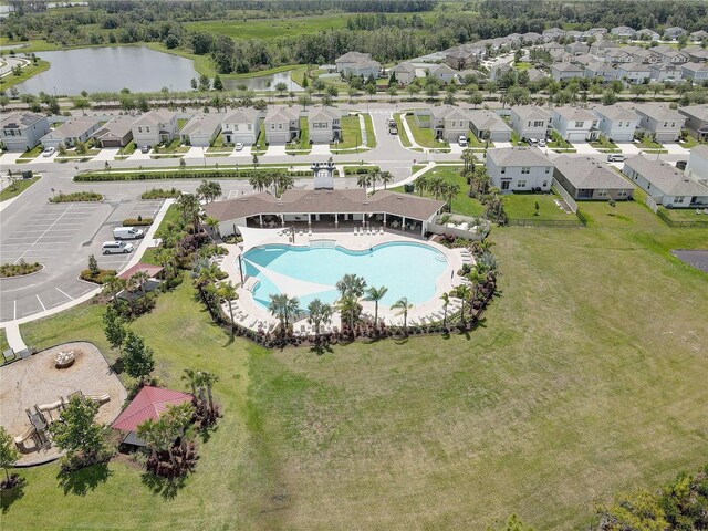 33062 Frosted Clover Way, Wesley Chapel, FL 33545 - aerial perspective of suburban area with a nearby body of water and a pool area