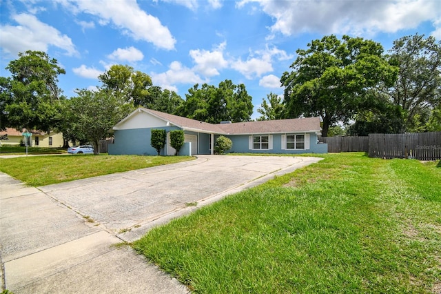 509 Stone Dr, Brandon, FL 33510 - ranch-style home with concrete driveway, an attached garage, and stucco siding