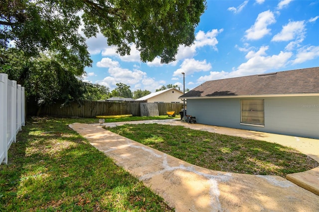509 Stone Dr, Brandon, FL 33510 - view of yard featuring a patio area