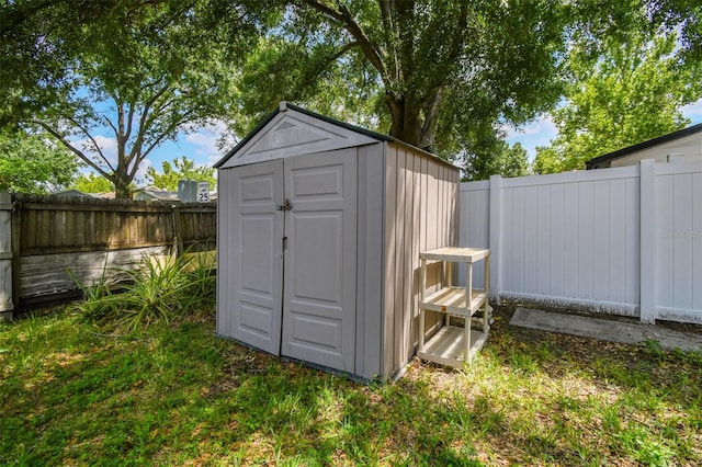 509 Stone Dr, Brandon, FL 33510 - view of shed featuring a fenced backyard