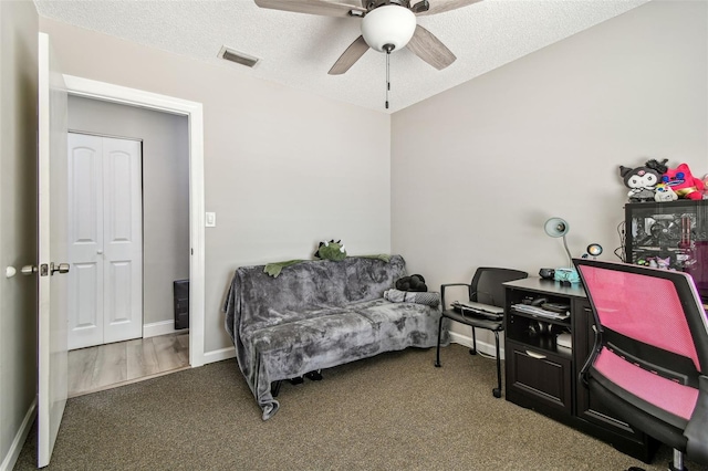 509 Stone Dr, Brandon, FL 33510 - home office featuring carpet, ceiling fan, a textured ceiling, and baseboards