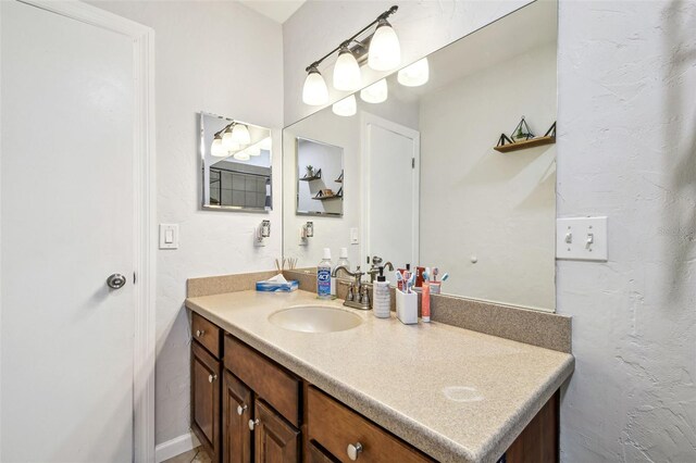 509 Stone Dr, Brandon, FL 33510 - bathroom with vanity and a textured wall