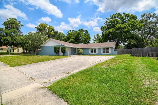 509 Stone Dr, Brandon, FL 33510 - ranch-style home featuring an attached garage, concrete driveway, and stucco siding