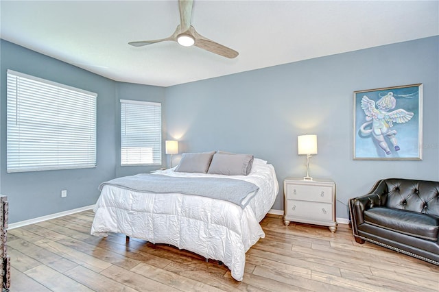 445 Arch Ridge Loop, Seffner, FL 33584 - bedroom with hardwood / wood-style floors, baseboards, and ceiling fan