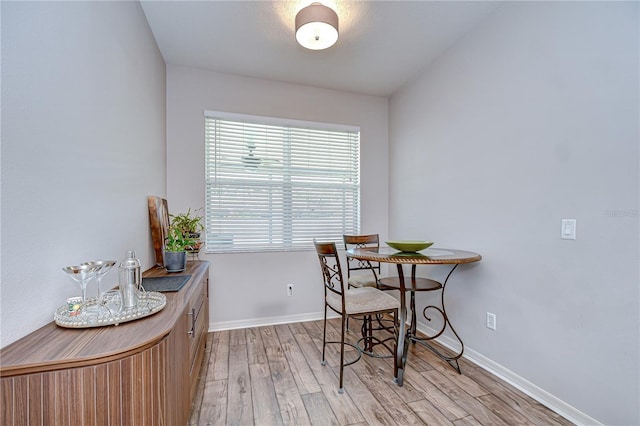 445 Arch Ridge Loop, Seffner, FL 33584 - dining room with light wood-style floors and baseboards