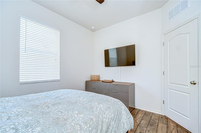 445 Arch Ridge Loop, Seffner, FL 33584 - bedroom with wood finished floors and baseboards