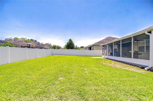 445 Arch Ridge Loop, Seffner, FL 33584 - view of yard featuring ceiling fan and a sunroom
