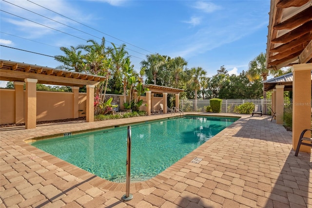 7246 Gaberia Rd, New Port Richey, FL 34655 - view of pool featuring a patio and a fenced backyard