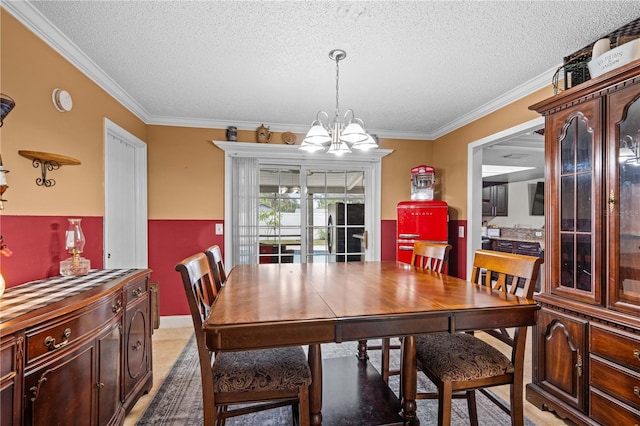 4120 Tyndale Dr, Brandon, FL 33511 - dining space with a chandelier, ornamental molding, and a textured ceiling