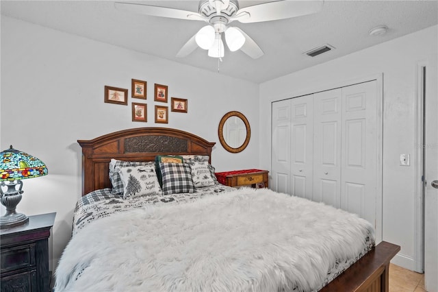 4120 Tyndale Dr, Brandon, FL 33511 - bedroom with a closet, a ceiling fan, and light tile patterned floors