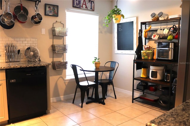 1048 Winding Water Way, Clermont, FL 34714 - dining space featuring baseboards and light tile patterned floors