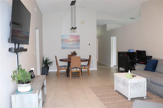 1048 Winding Water Way, Clermont, FL 34714 - living room featuring light tile patterned floors, baseboards, and high vaulted ceiling