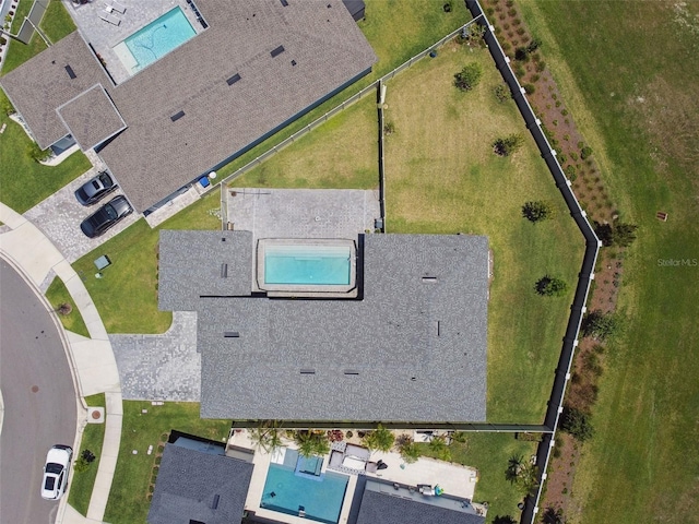 8421 Ivy Stark Blvd, Wesley Chapel, FL 33545 - drone / aerial view of a pool area