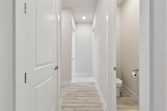 8421 Ivy Stark Blvd, Wesley Chapel, FL 33545 - hall with light wood-style flooring, recessed lighting, and baseboards