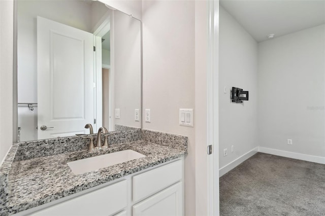 8421 Ivy Stark Blvd, Wesley Chapel, FL 33545 - bathroom with vanity and baseboards