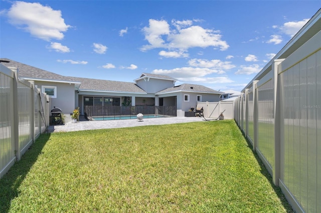 8421 Ivy Stark Blvd, Wesley Chapel, FL 33545 - rear view of house featuring a patio area and stucco siding