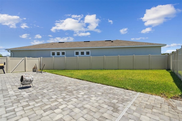 8421 Ivy Stark Blvd, Wesley Chapel, FL 33545 - view of patio / terrace with an outdoor fire pit