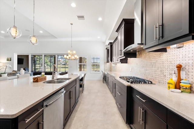 1416 Via Verdi Dr, Palm Harbor, FL 34683 - kitchen with stainless steel appliances, wall chimney exhaust hood, recessed lighting, healthy amount of natural light, and backsplash